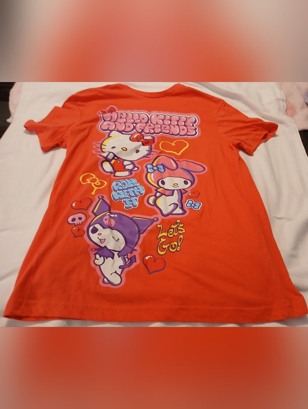 NWOT Women's Hello Kitty and Friends Orange Graphic Tee.